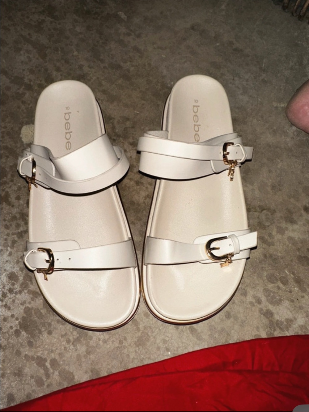 BEBE tan sandals with gold charms size 10